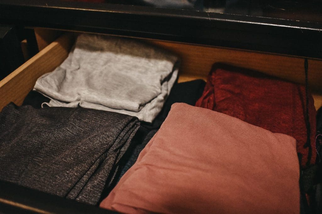 Workout shirts and t-shirts folded per the Marie Kondo method